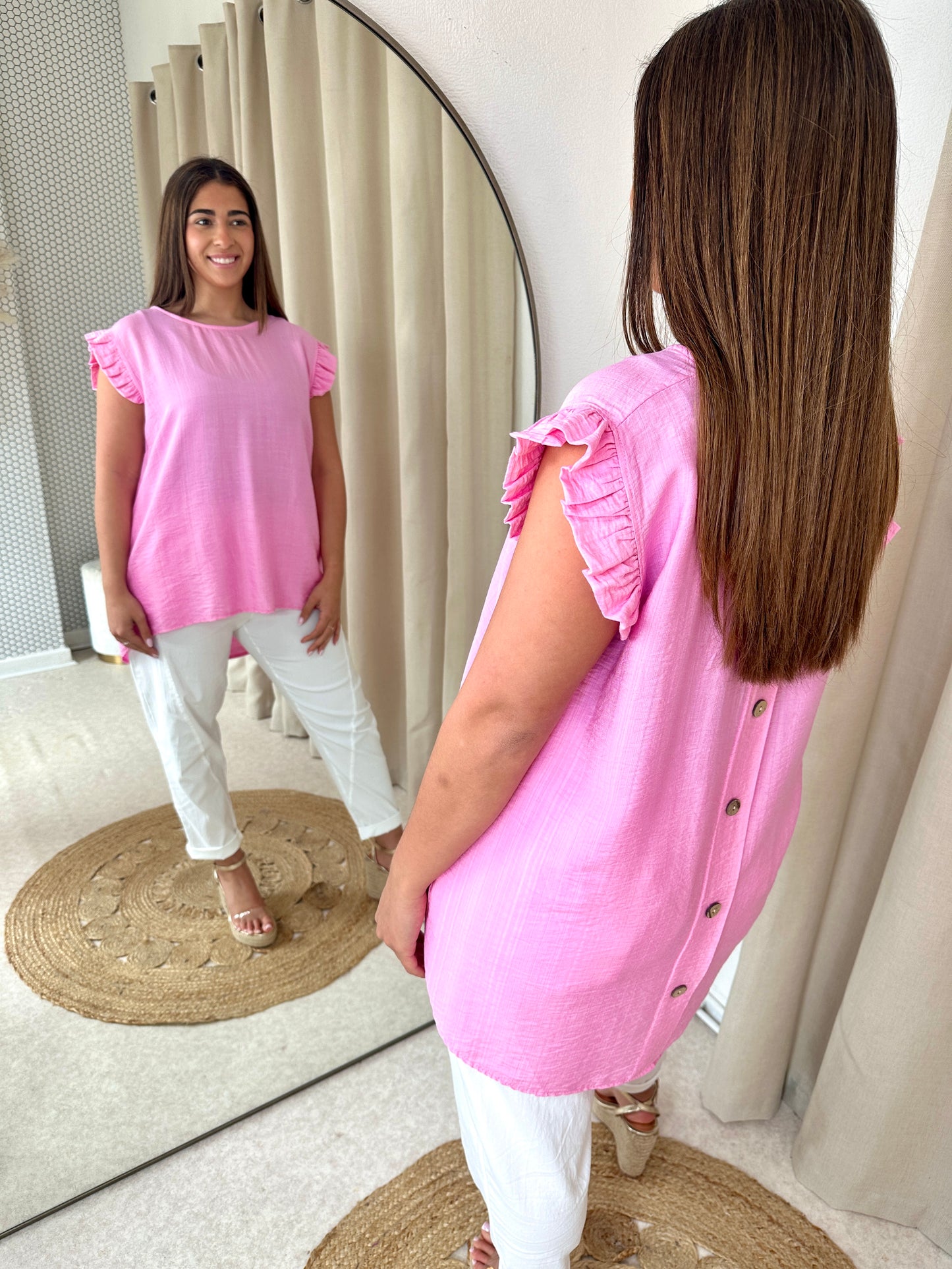 BUTTONED BACK