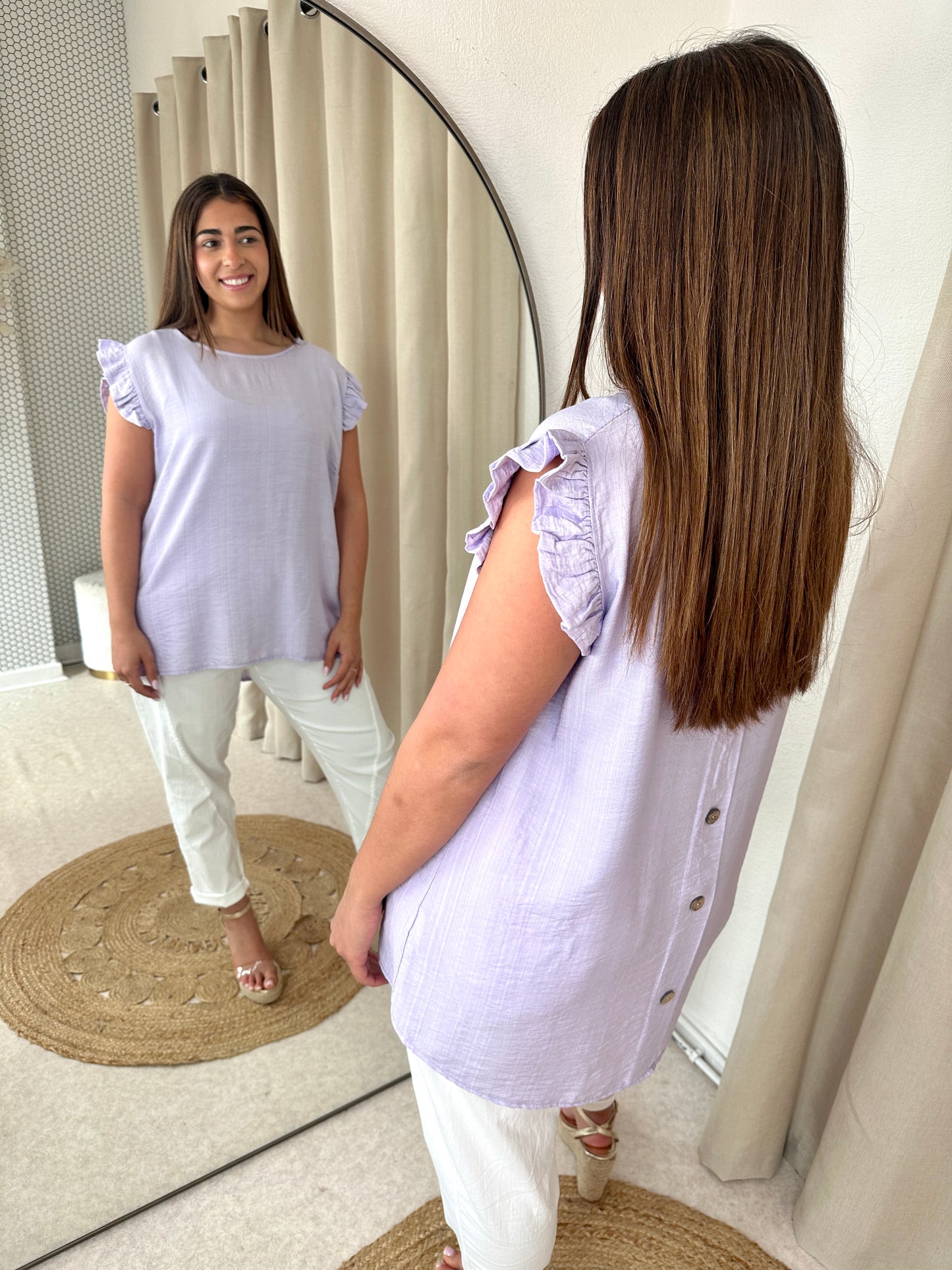 BUTTONED BACK