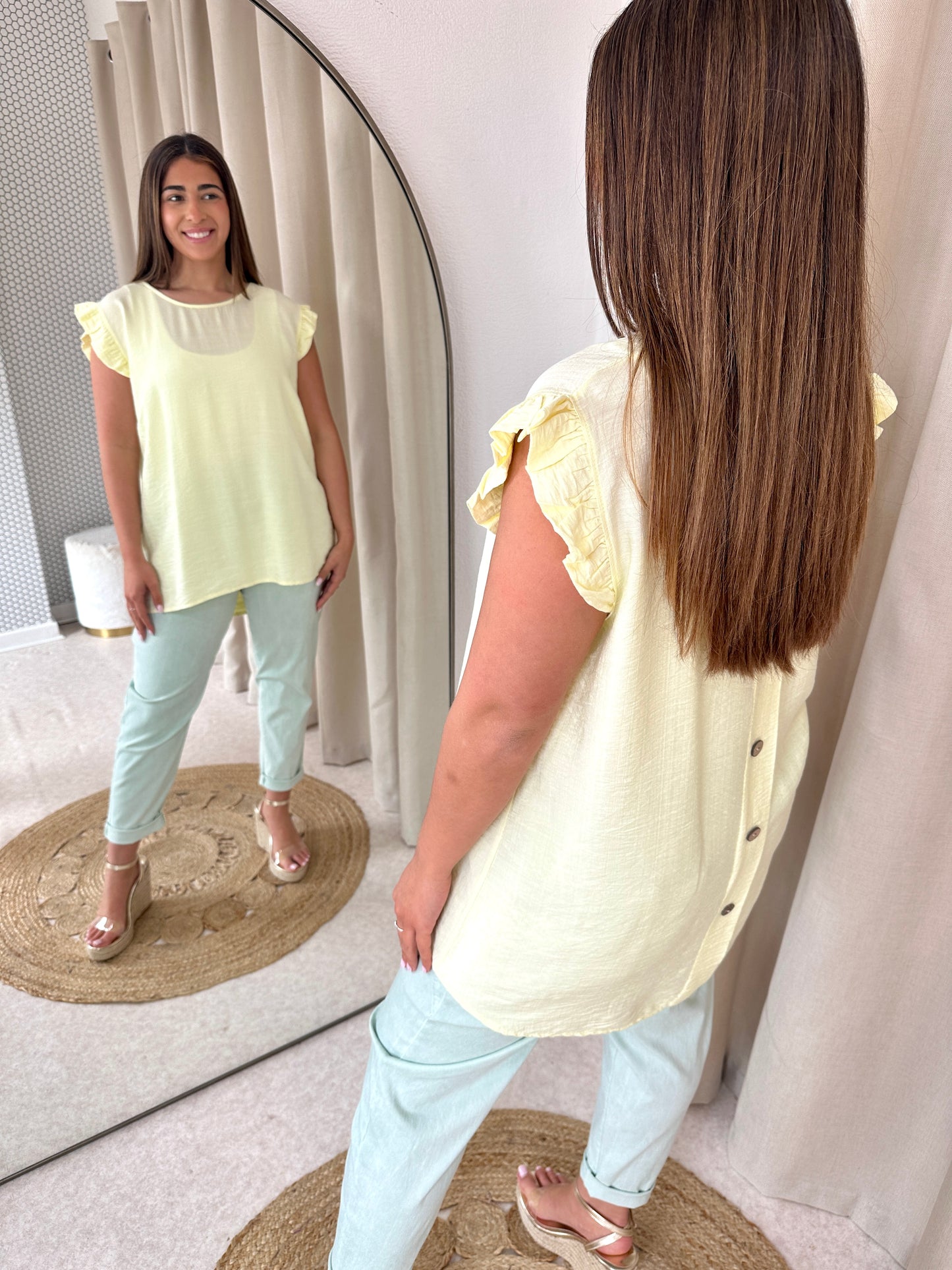 BUTTONED BACK
