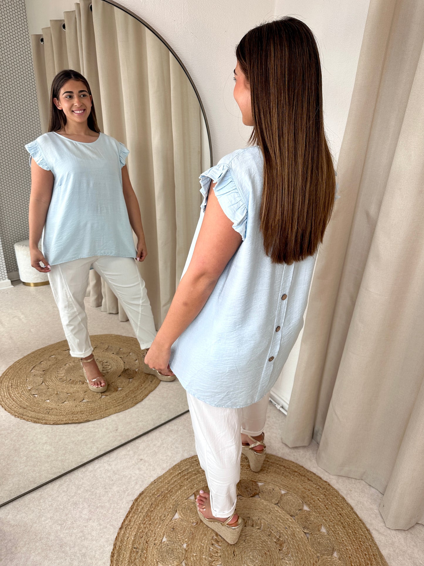 BUTTONED BACK