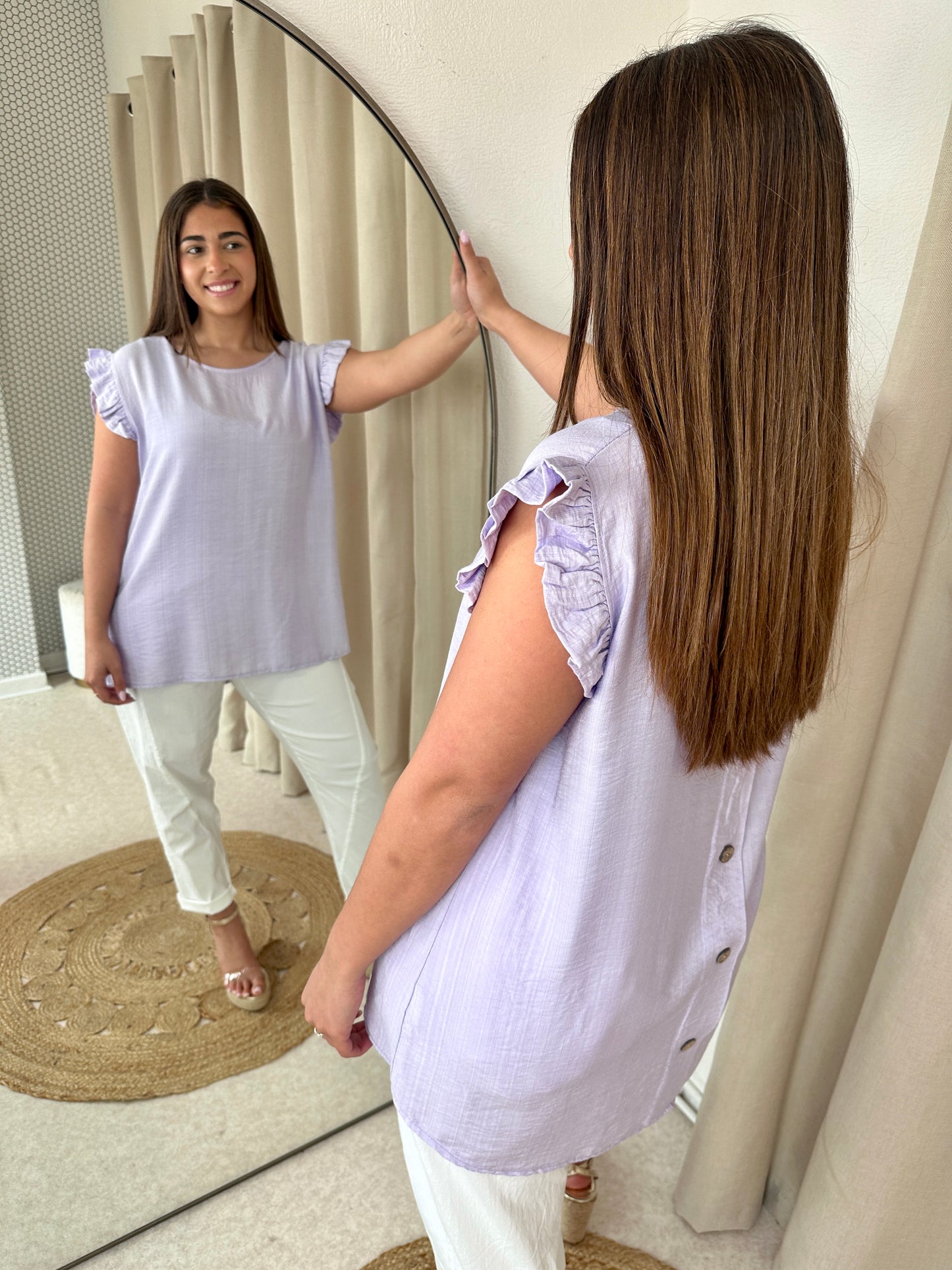 BUTTONED BACK