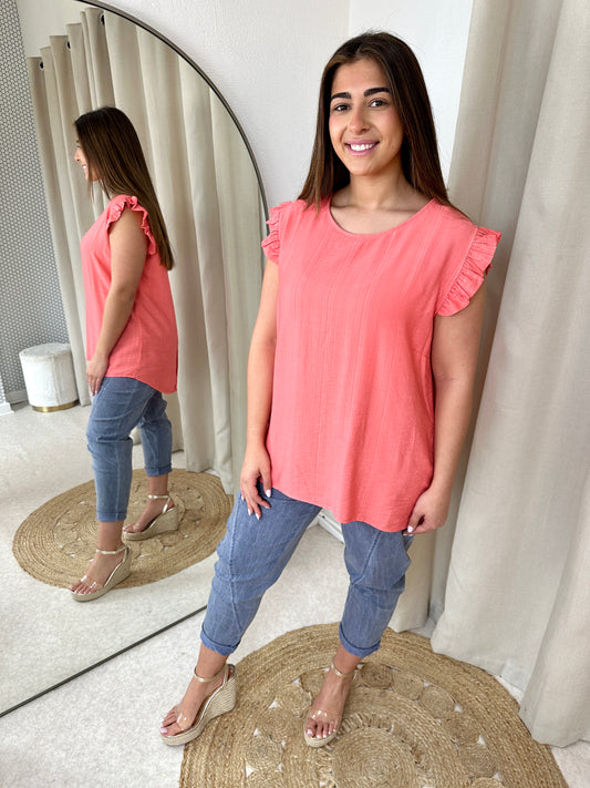 BUTTONED BACK